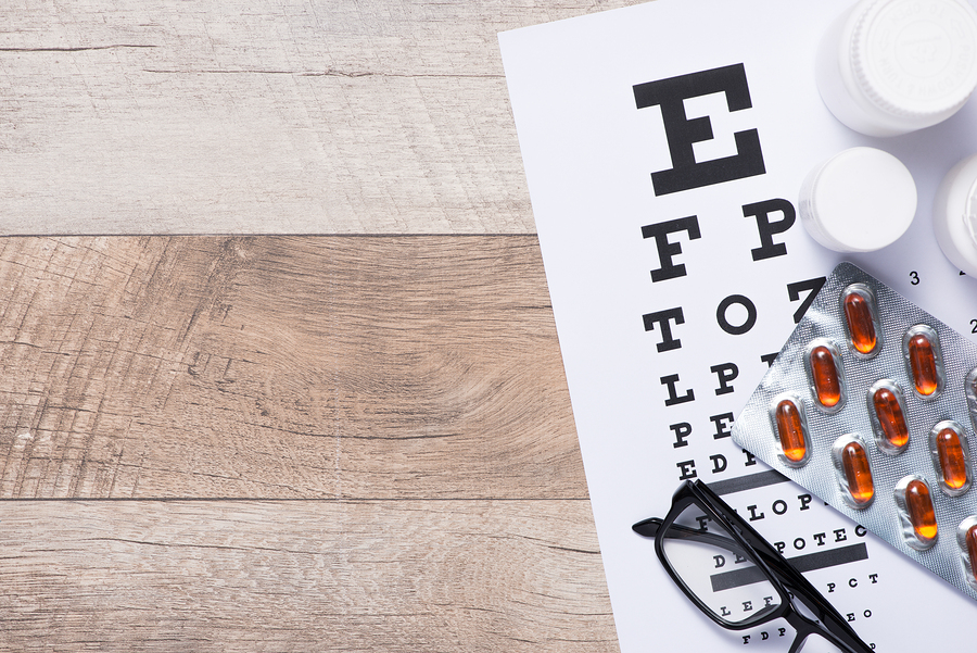Healthy eyes. Eye chart and medicine. Concept of Eyes care for healthy eyes.