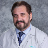 Dr. Arminio  Surucci